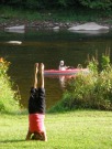 Rose performing yoga as unsuspecting kayakers pass on the Clarion River. They were looking for wildlife ... and found it!